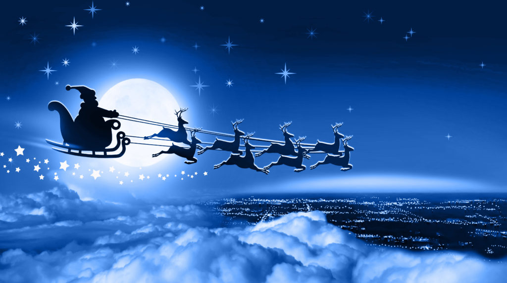 Santa Claus in a sleigh fly over Earth on background of full moon in night winter cloudy sky