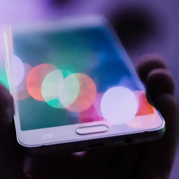 picking a phone number hero image of a hand holding a phone.